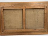 an old wooden frame with a picture of a couple of people