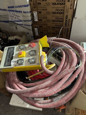 a box with a bunch of hoses and a box with a bunch of wires on it
