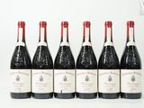 six bouteilles de vin rouge alignées