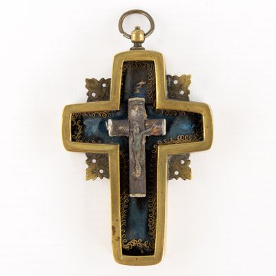 an image of a cross on a chain on a white background