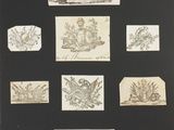 a black and white photo of a bunch of stamps on a table