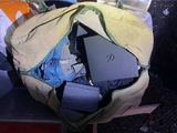 a laptop inside of a bag on a table