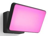 a close up of a pink light mounted on a wall