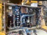 a box with wires and other electrical equipment inside of it