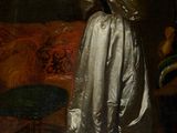 painting of a woman in a white dress standing in a room next to a couch