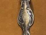 a spoon that is sitting on top of a table