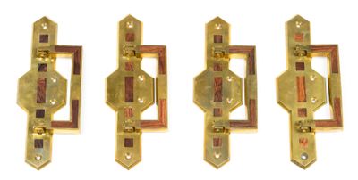 three brass door handles on a white background with a white background