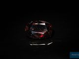 a red diamond on a black surface
