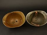 pair of ww1 british army steel helmets