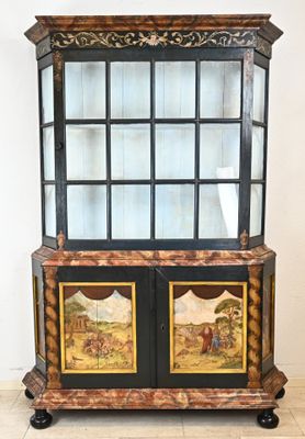 une image représentant une armoire à deux portes avec un tableau sur la façade