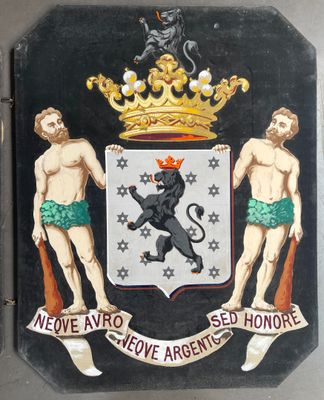 une plaque noire sur laquelle figurent un lion et un lion