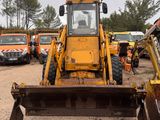 a bulldozer that is sitting in the dirt