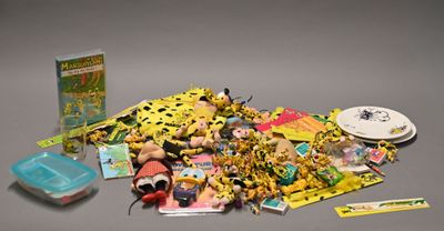 a pile of toys and other items on a table
