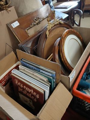 a box full of assorted items sitting on a table