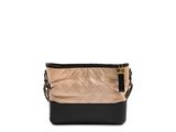 a small black and gold bag with a chain strap