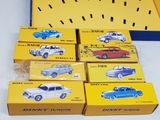 six boxes of different models of cars on a table