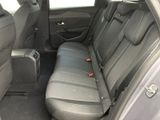the back seats of a car are empty in the back of the car
