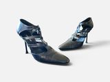 paire d'escarpins en cuir noir pour femme, avec lanières et coussinets au talon
