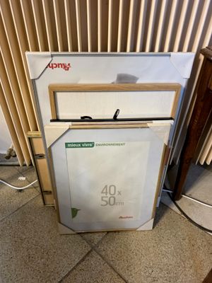 a refrigerator and freezer sitting on the floor in front of a radiator