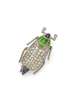 une broche en forme de scarabée, sertie de diamants et d'émail