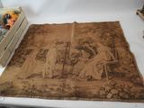 a brown cloth with a picture of people on it