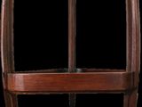 a close up of a wooden table with a glass top