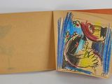 a drawing on the inside of an open book