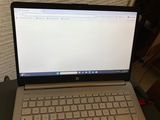 a laptop computer sitting on top of a desk