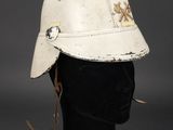 a close up of a white helmet on a mannequin head