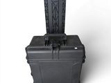 an image of a black case with a handle on top of it