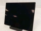 an image of a laptop computer on a stand