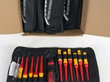 a box with a bunch of tools in it sitting on top of a table