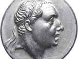 an old coin with a woman ' s head on it ' s side
