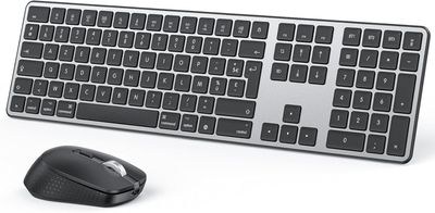 a computer keyboard and a mouse on a white surface