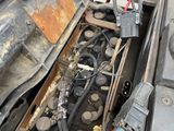 a car engine that is sitting in the back of a truck