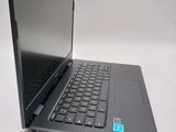 a laptop computer that is sitting on a table