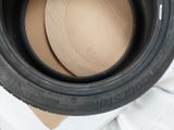 tires are stacked on top of each other on a cardboard box