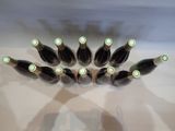 bottles of wine are lined up in a row on a table
