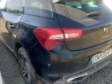 a picture of a black car parked in a parking lot