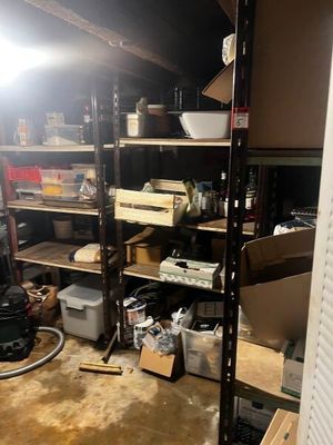 a room that has a lot of shelves and shelves in it