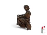 an image of a statue of a woman sitting on a bench