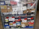 a metal cart with many boxes on top of it