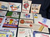 many different types of postcards laid out on a table