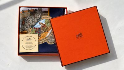 an orange box with a picture of a castle inside of it