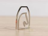 a small metal object that is sitting on a table