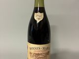 a bottle of wine that is sitting on a table