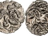 une pièce de monnaie en argent portant l'image d'un visage d'homme