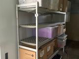 many boxes and boxes on the shelves in the room