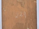 an old wooden box with a label on it