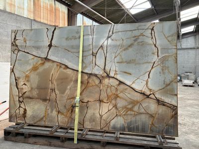 a large slab of marble on a pallet in a warehouse